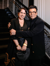 Guneet Monga in Black Zoran Clutch