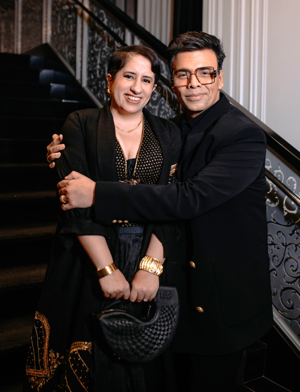 Guneet Monga in Black Zoran Clutch