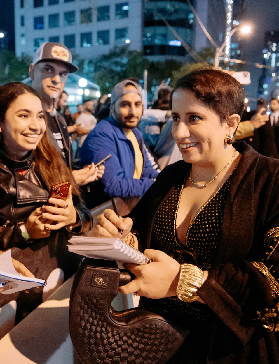 Guneet Monga in Black Zoran Clutch