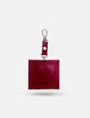 Red heart-shaped bag charm