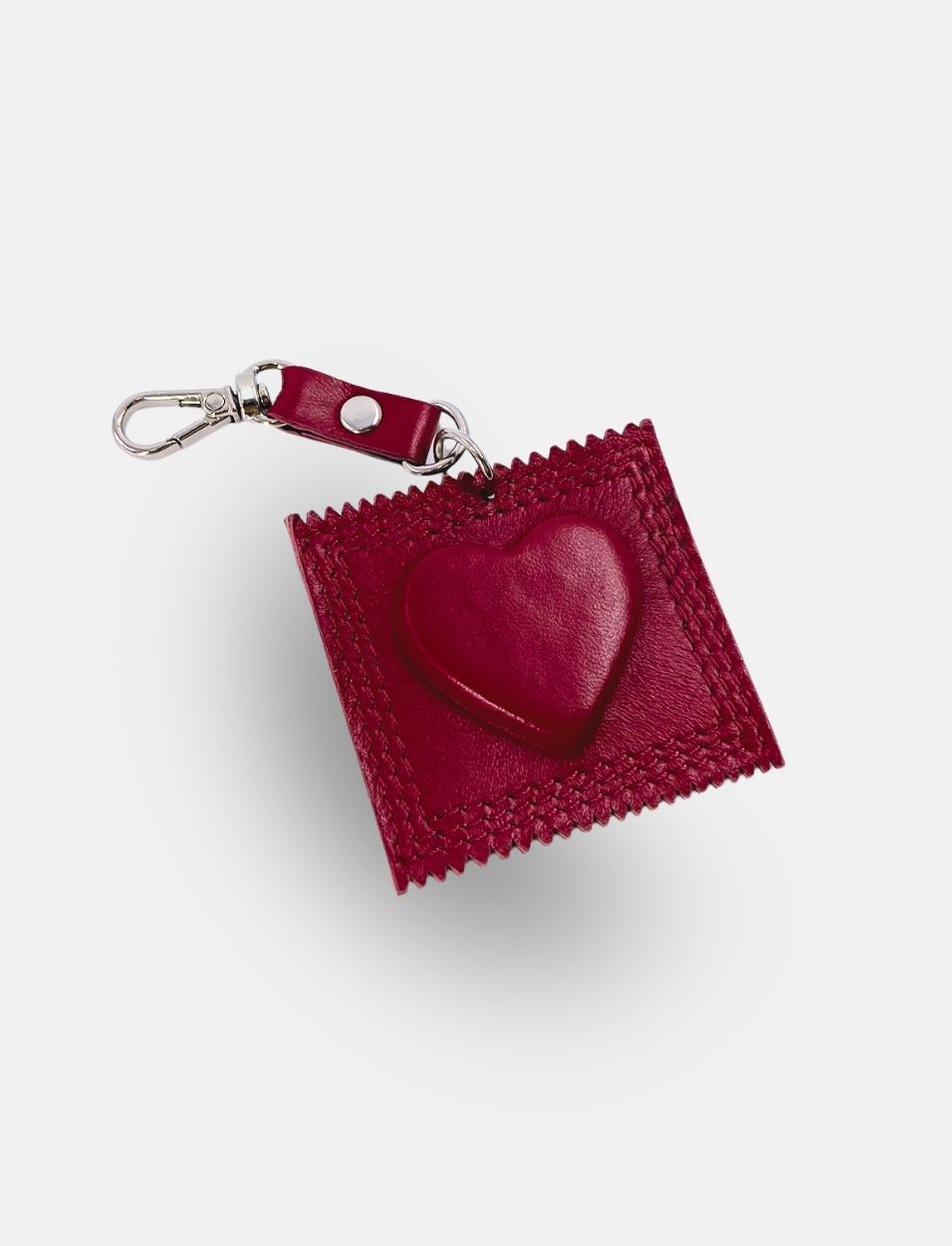 Red heart-shaped bag charm