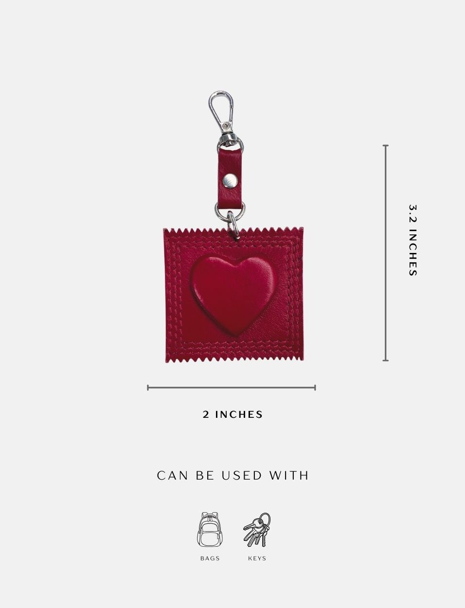 Red heart-shaped bag charm