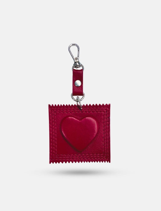 Red heart-shaped bag charm